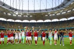 奥地利在欧洲杯C组最后一轮比赛中1比0击败乌克兰